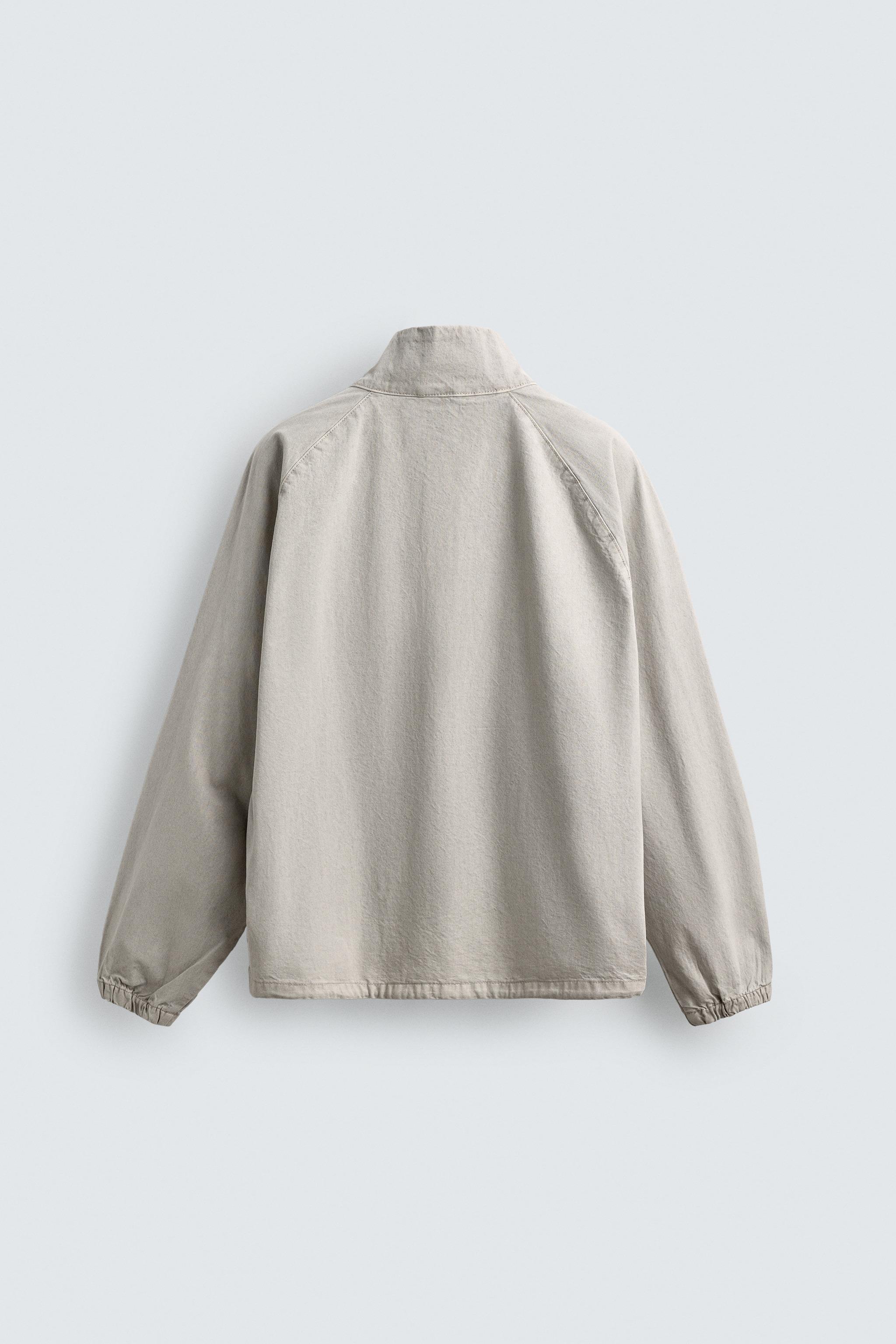 ZIPPERED POUCH POCKET SWEATSHIRT